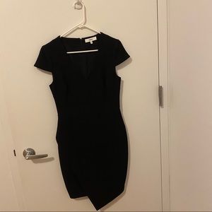 Likely size 6 black v neck body con dress